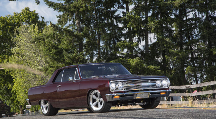 001 1965 Chevrolet Chevelle burgundy restomod parked roadside stance profile