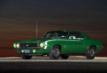 001 1969 Camaro SS 396 Hugger Green sunset side view Goodyear tires ZL2 hood