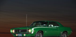 001 1969 Camaro SS 396 Hugger Green sunset side view Goodyear tires ZL2 hood