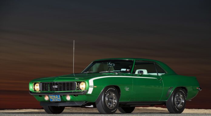 Fully Restored 1969 Camaro 001 1969 Camaro SS 396 Hugger Green sunset side view Goodyear tires ZL2 hood