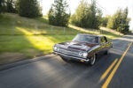 002 1965 Chevrolet Chevelle cruising highway motion shot classic muscle car