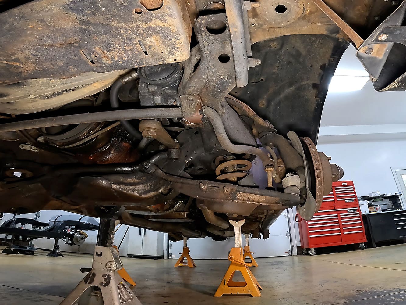 003 1978 camaro original front suspension disassembled on jack stands