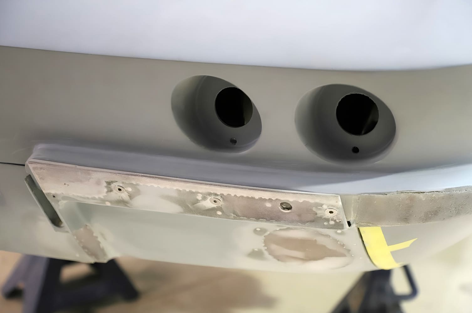 004 1965 Corvette rear panel metalwork custom lower valance shaping