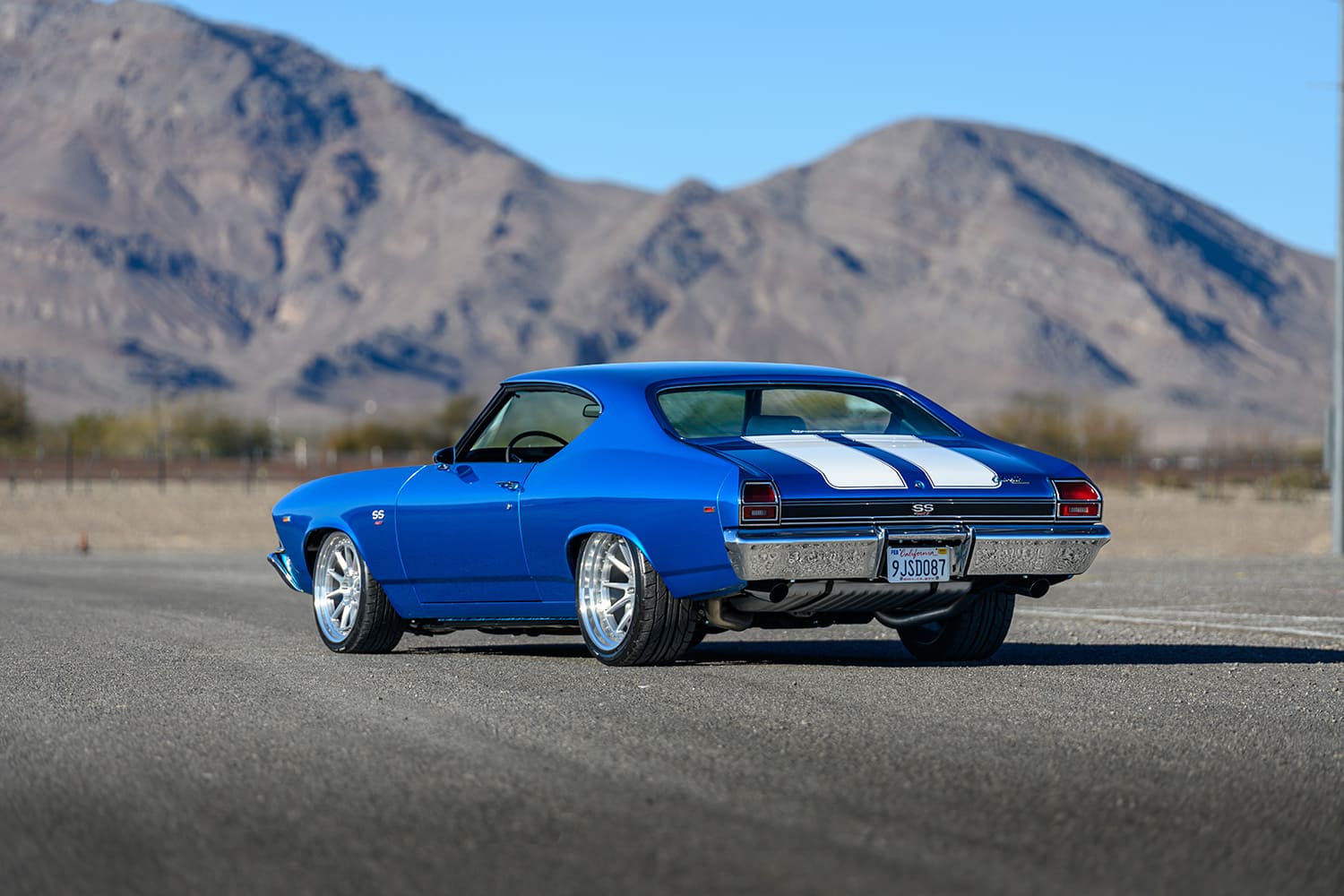 006 1969 Chevelle SS rear three quarter California plate dual exhaust white rally stripes