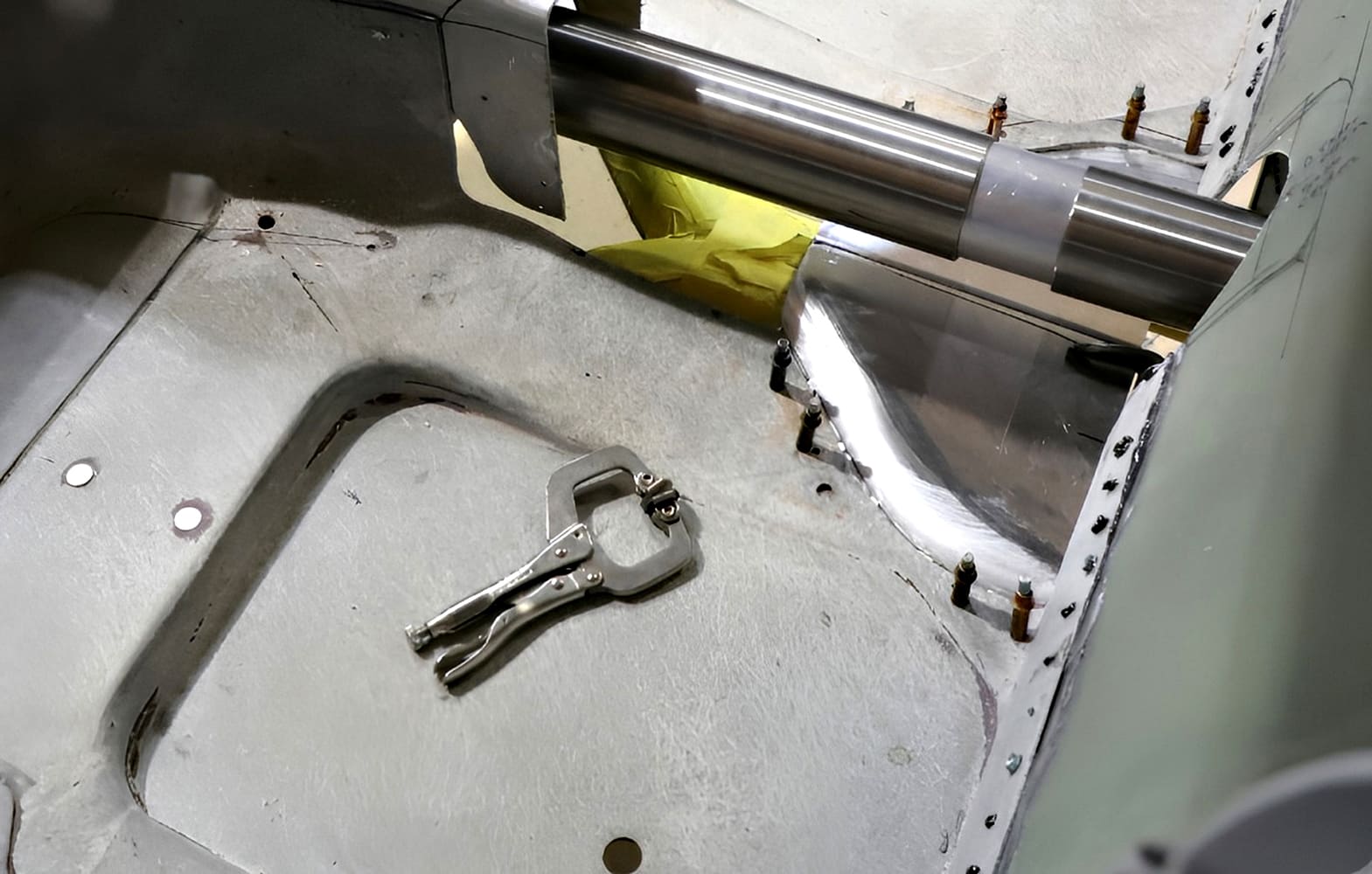 015 1965 Corvette driveshaft tunnel mock up with polished panels and cleco fasteners