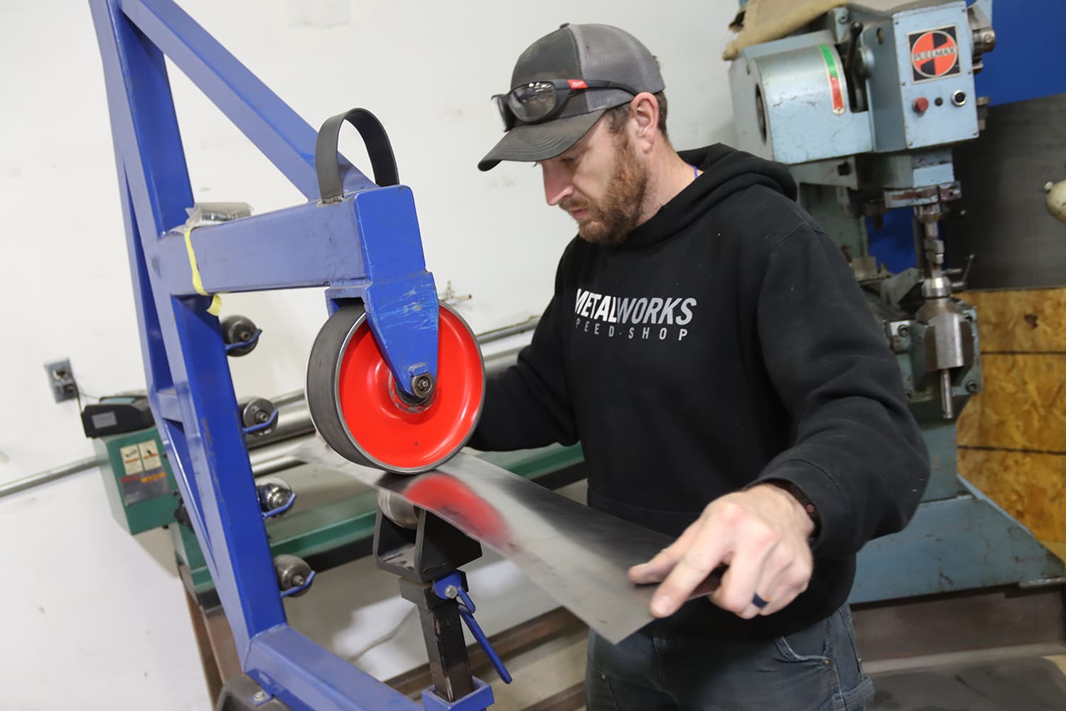 015 1967 Nova cowl panel shaping continues with English wheel forming compound curvature in raw steel