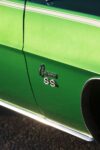 018 1969 Chevrolet Camaro SS green door panel with factory style Camaro SS emblem and white pinstripe