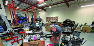 01 1956 Mustang Godzilla engine install shop Tremec transmission crate setup SST cart