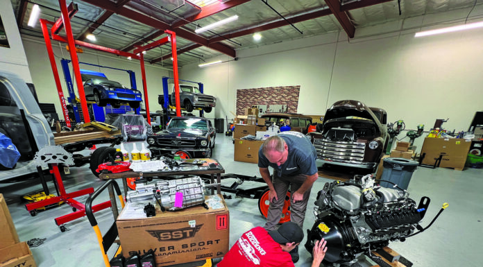 01 1956 Mustang Godzilla engine install shop Tremec transmission crate setup SST cart