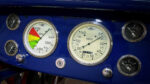 10 1932 Ford roadster red interior with blue dash wood wheel and vintage hot rod gauges