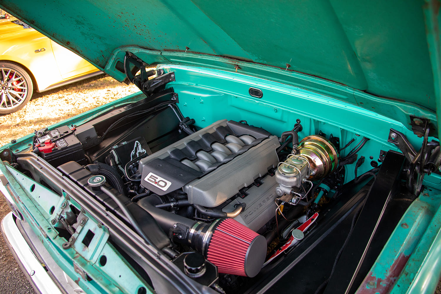 10 1966 Ford F 100 Coyote swap 5 0L engine bay restomod