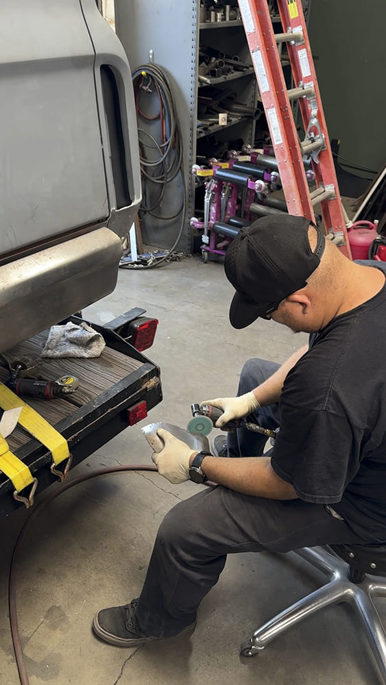 11 1967 c10 bumper piece prep grinding with roloc disc in fab shop