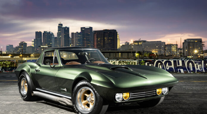 001 1966 Chevy Corvette widebody side pipes gold wheels green paint city backdrop