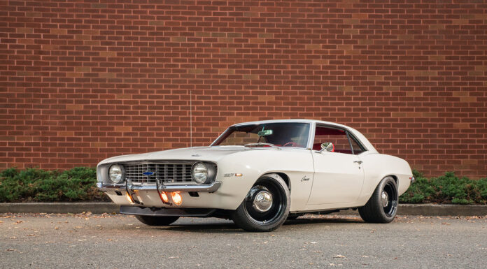 Tame but Potent 1969 Camaro Restomod 001 1969 chevy camaro coupe white steel wheels chrome caps