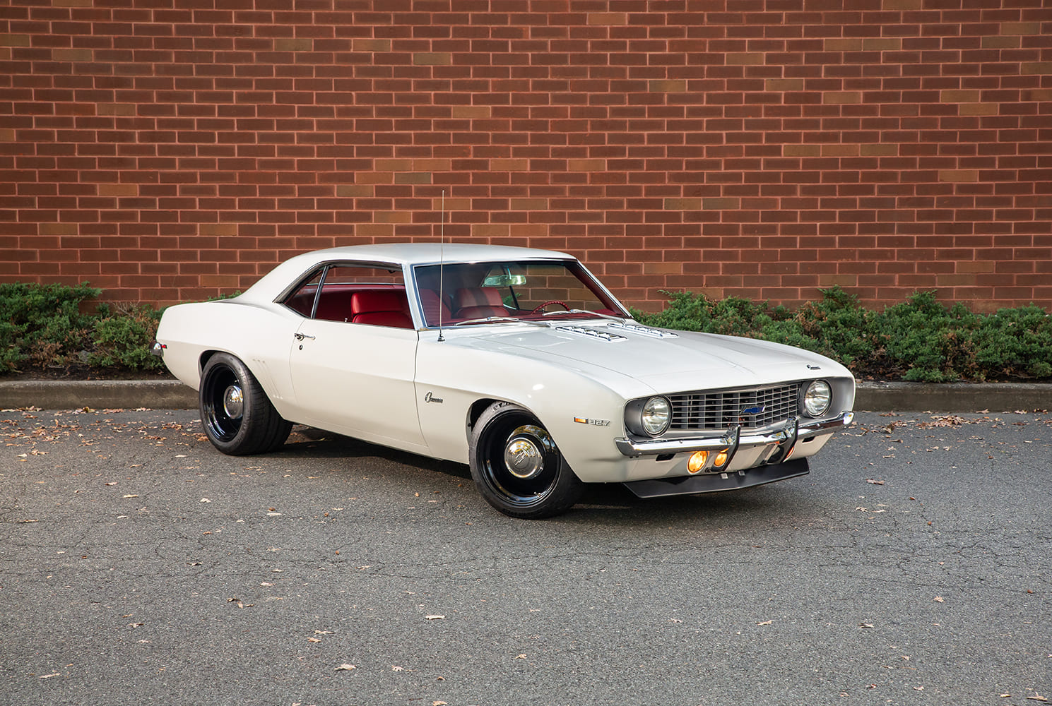 002 1969 chevy camaro red interior white exterior front angle