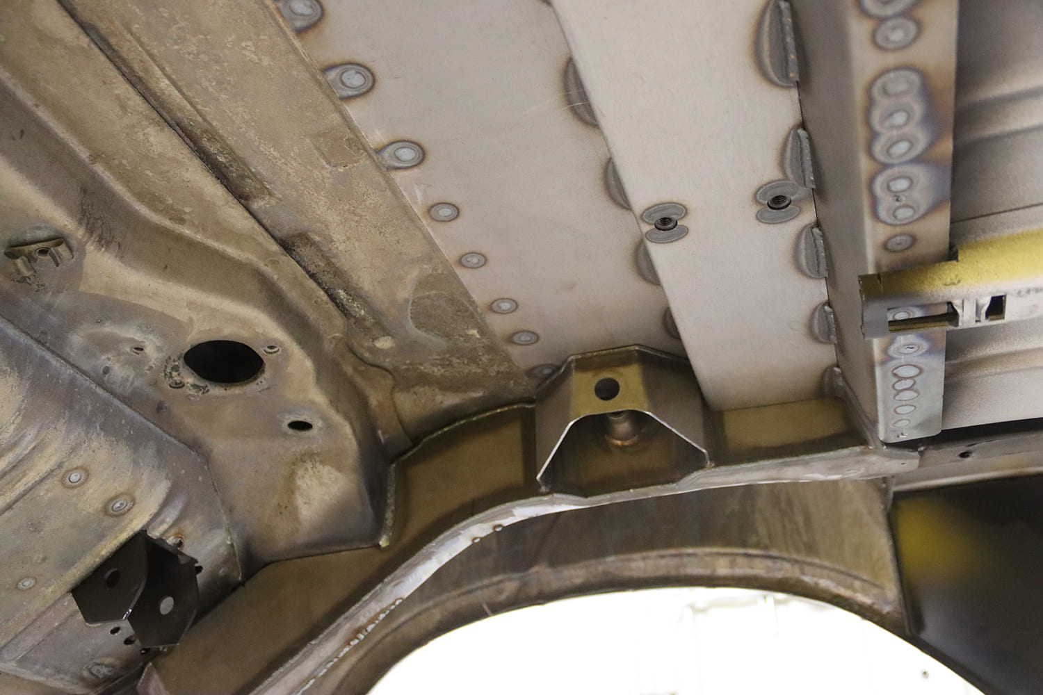 006 1963 Chevy Nova Frame rails reinforced with Detroit Speed mounting brackets during underbody fabrication