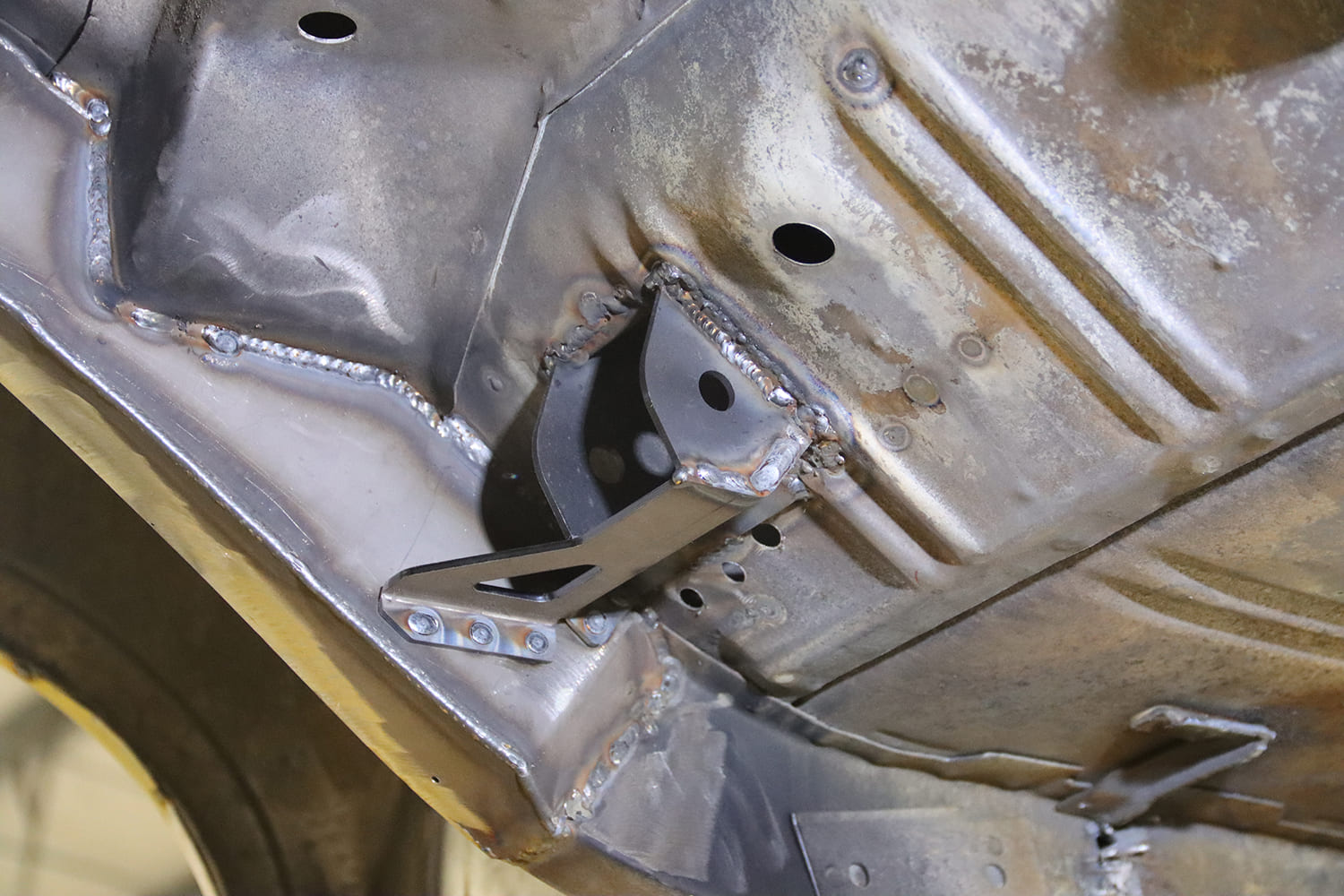 008 1963 Chevy Nova Upper shock mount bracket installed using Detroit Speed’s chassis layout reference