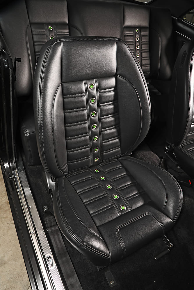 011 1966 chevy nova custom black seats green rivet detail