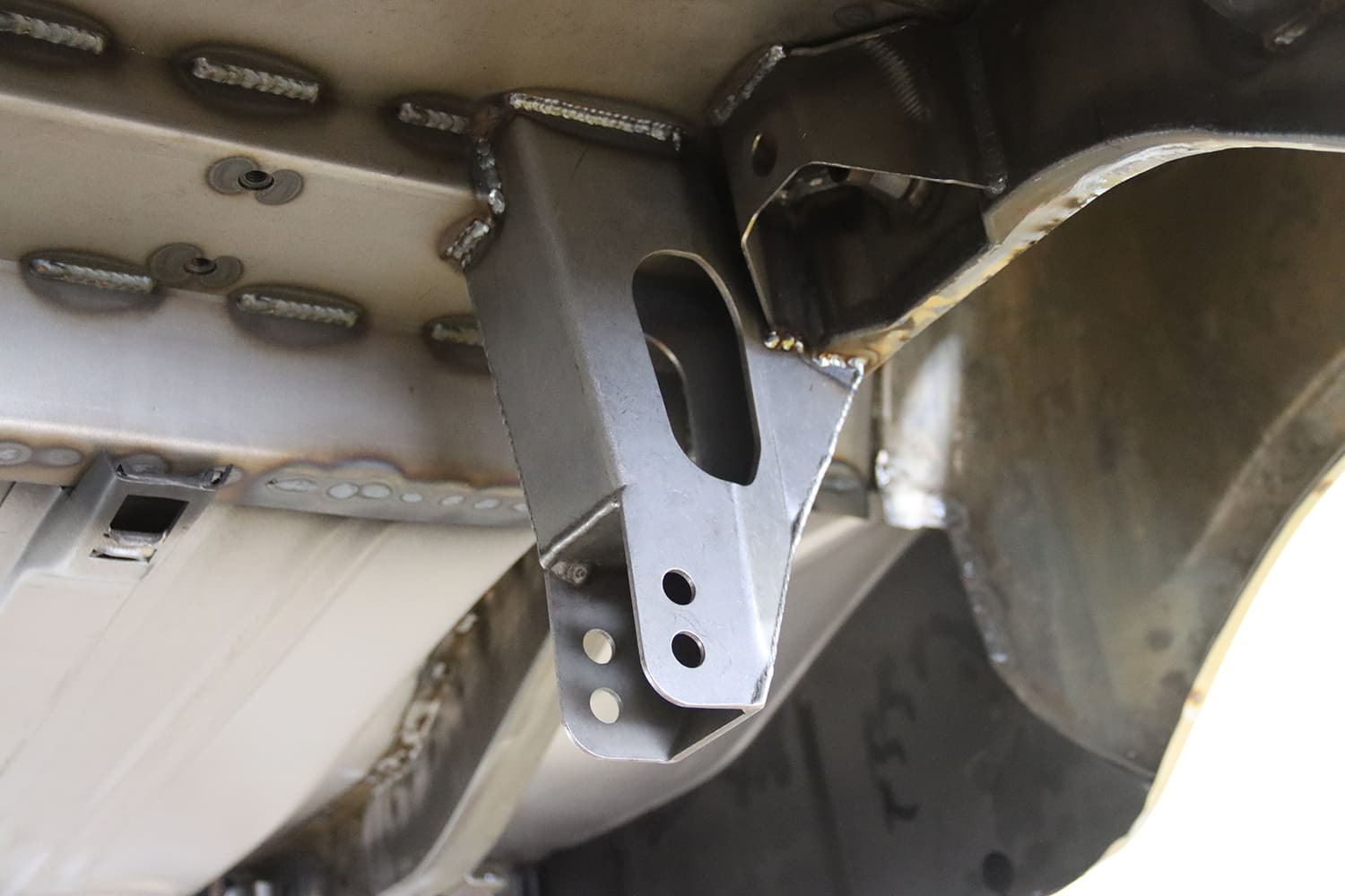 012 1963 Chevy Nova Rear coilover mount welded cleanly into the inner wheel tub structure