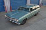 02 1965 chevelle wagon teal paint black wheels roof rack front angle