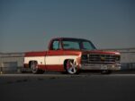 02 1977 Chevy C10 custom squarebody orange white slammed truck side angle