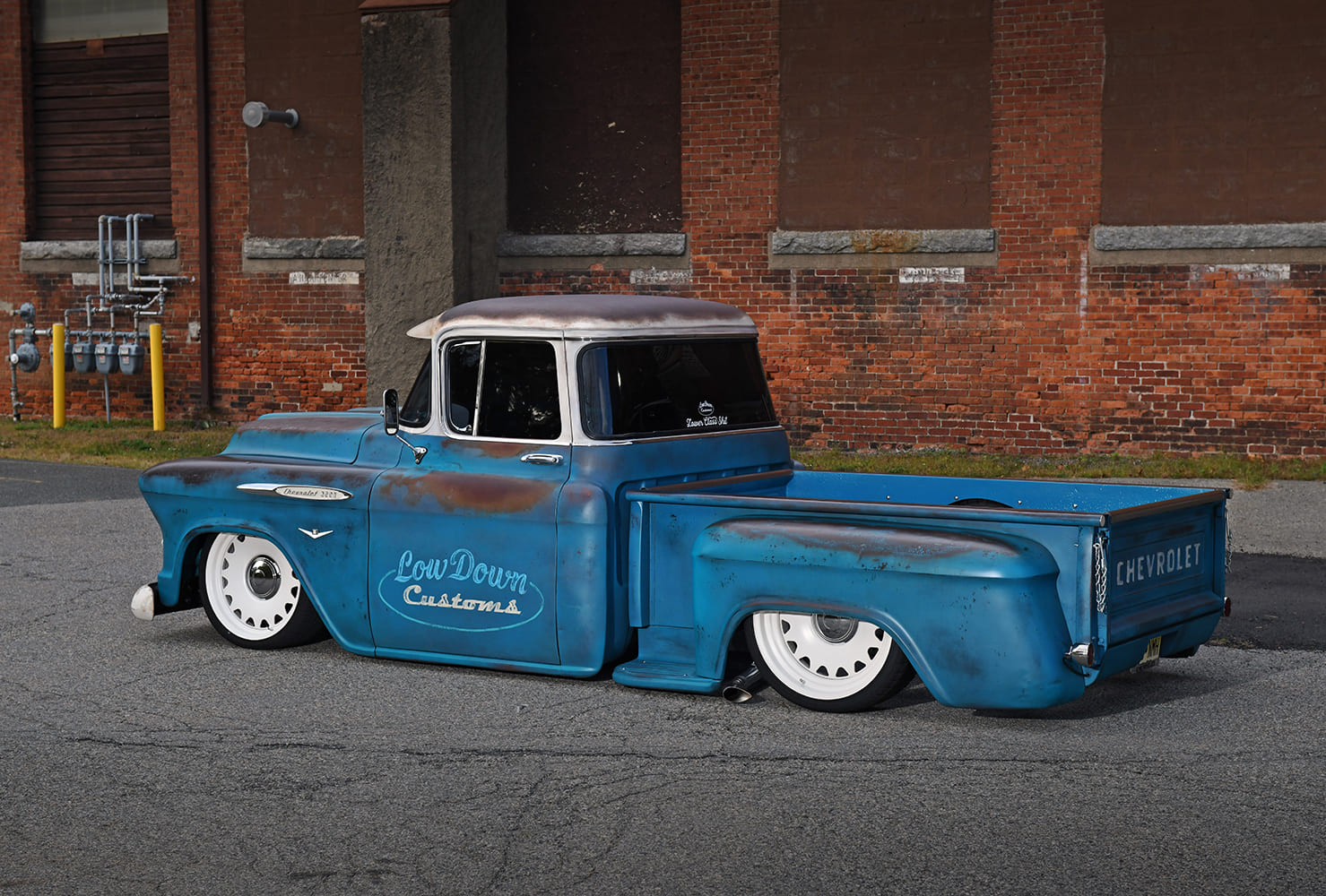 04 1957 Chevy 3100 custom truck rear angle Low Down Customs logo