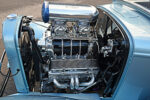1932 Ford Five Window Coupe engine bay polished supercharger dual carburetors high performance hot rod motor