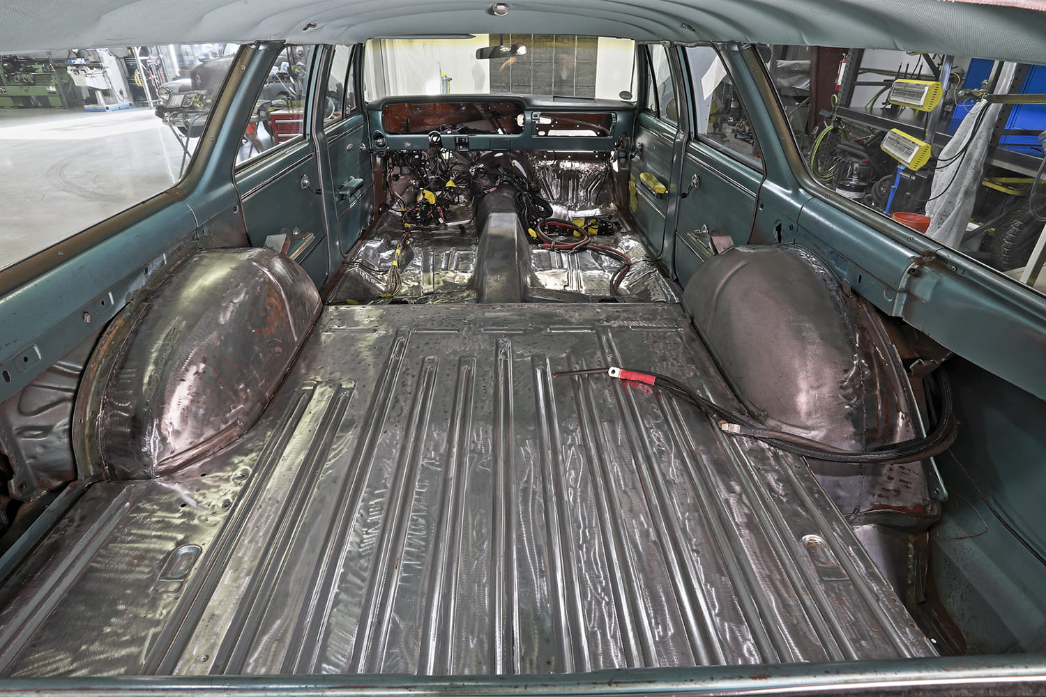 10 1965 chevelle wagon interior stripped rear section sound deadening wiring harness visible