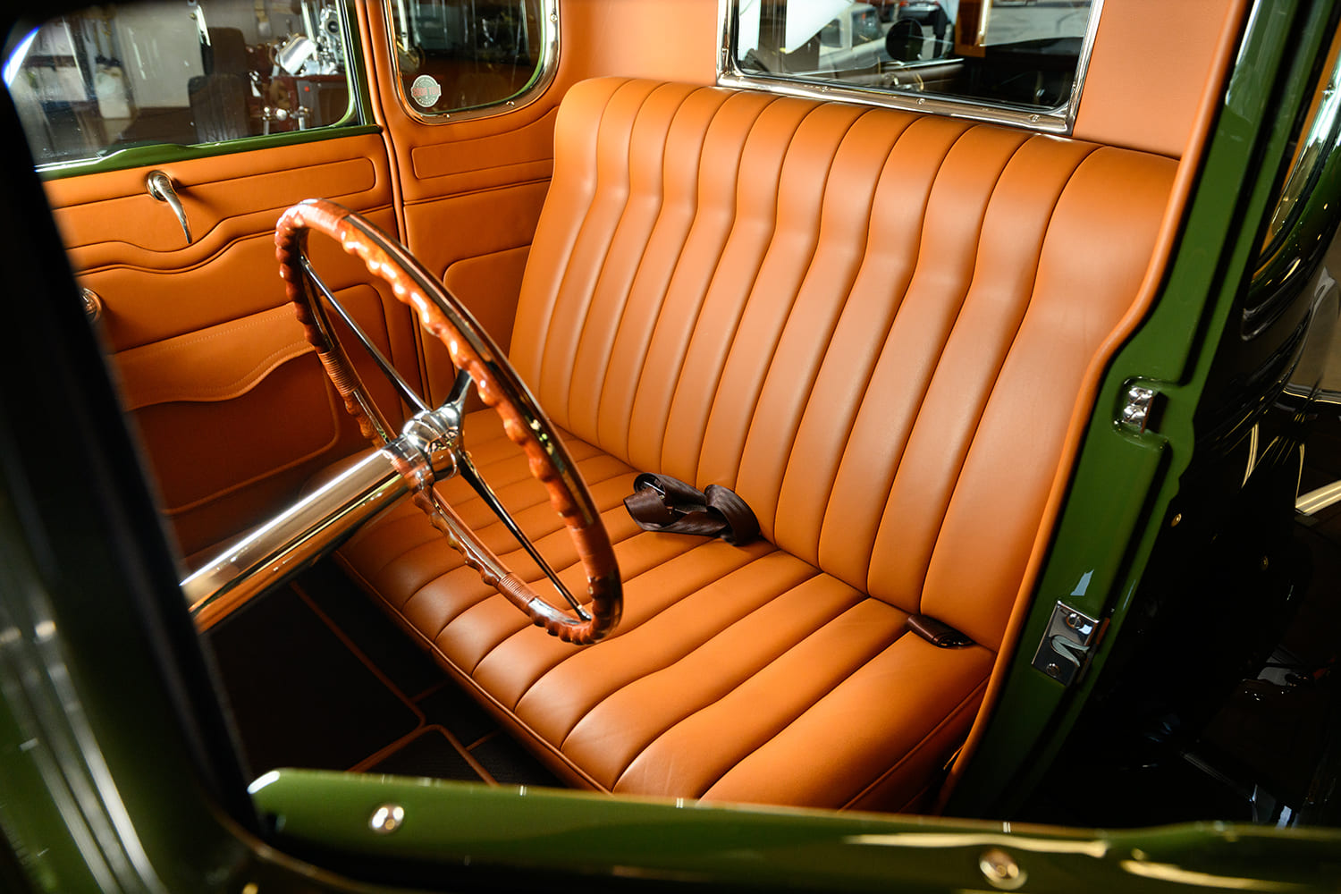 14 1931 ford coupe bench seat tan leather tuck and roll upholstery door panel detail