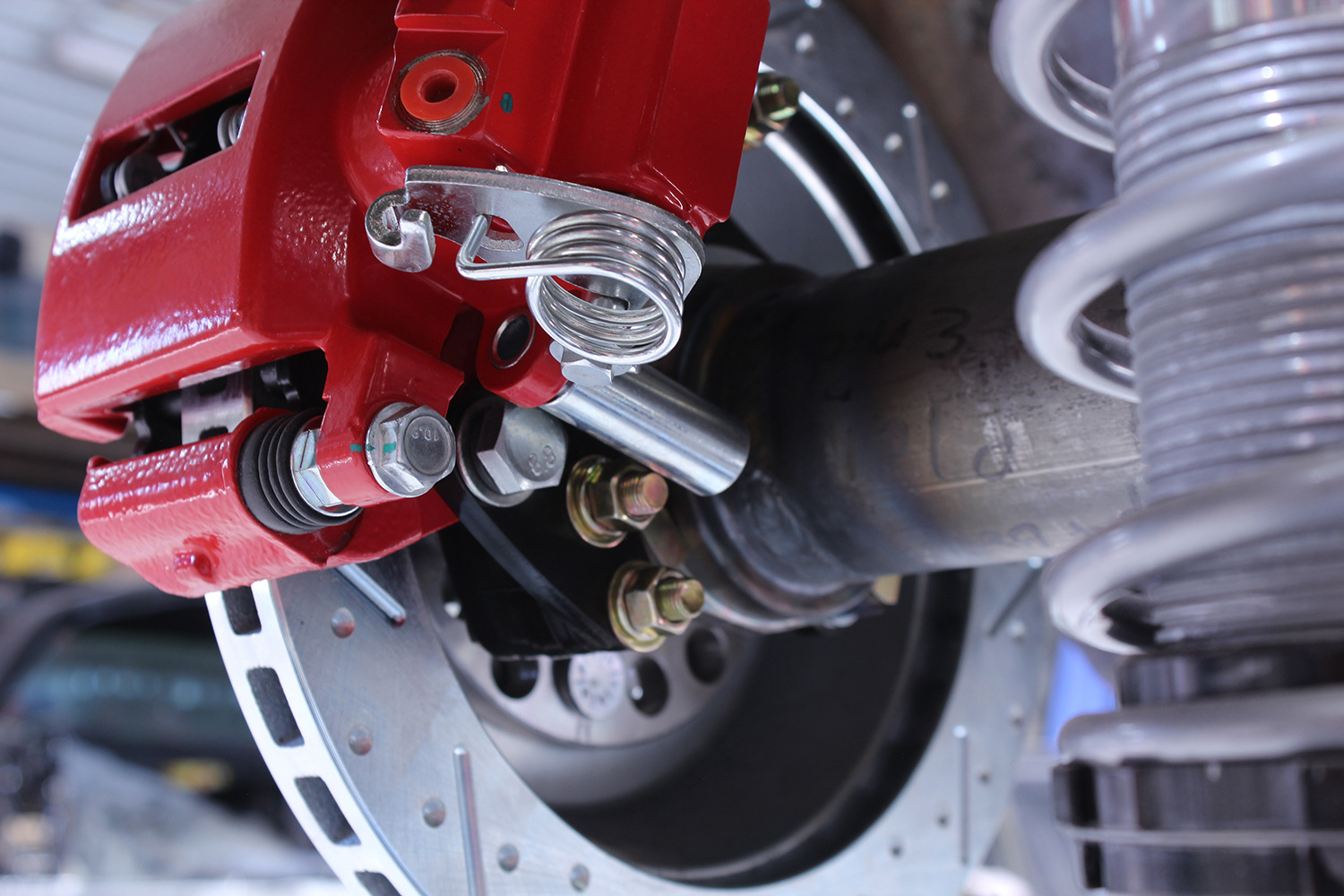 16 1965 mustang cpp rear disc brake completed install red caliper jegs coilover bracketed setup