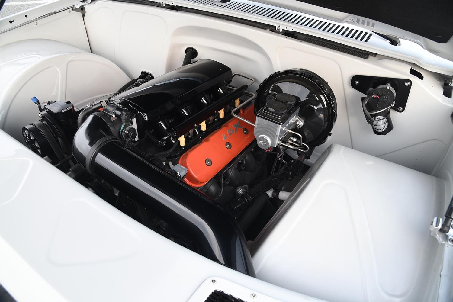16 1986 Chevy C10 LSX swap clean bay smoothed firewall black intake