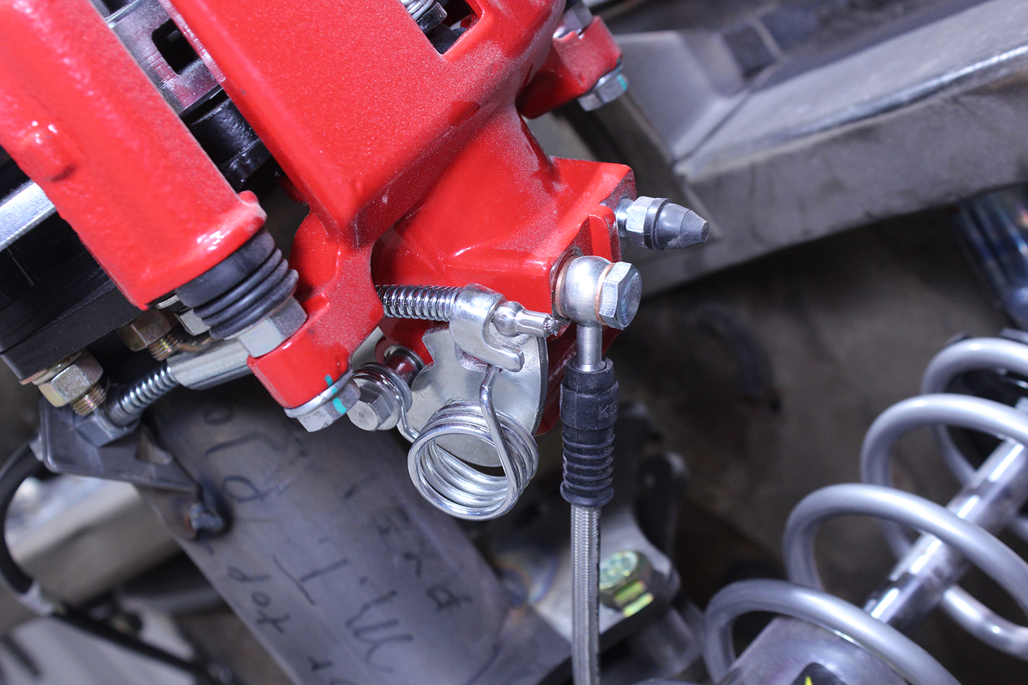 17 1965 mustang cpp e brake hookup red caliper spring return cable mount full rear view