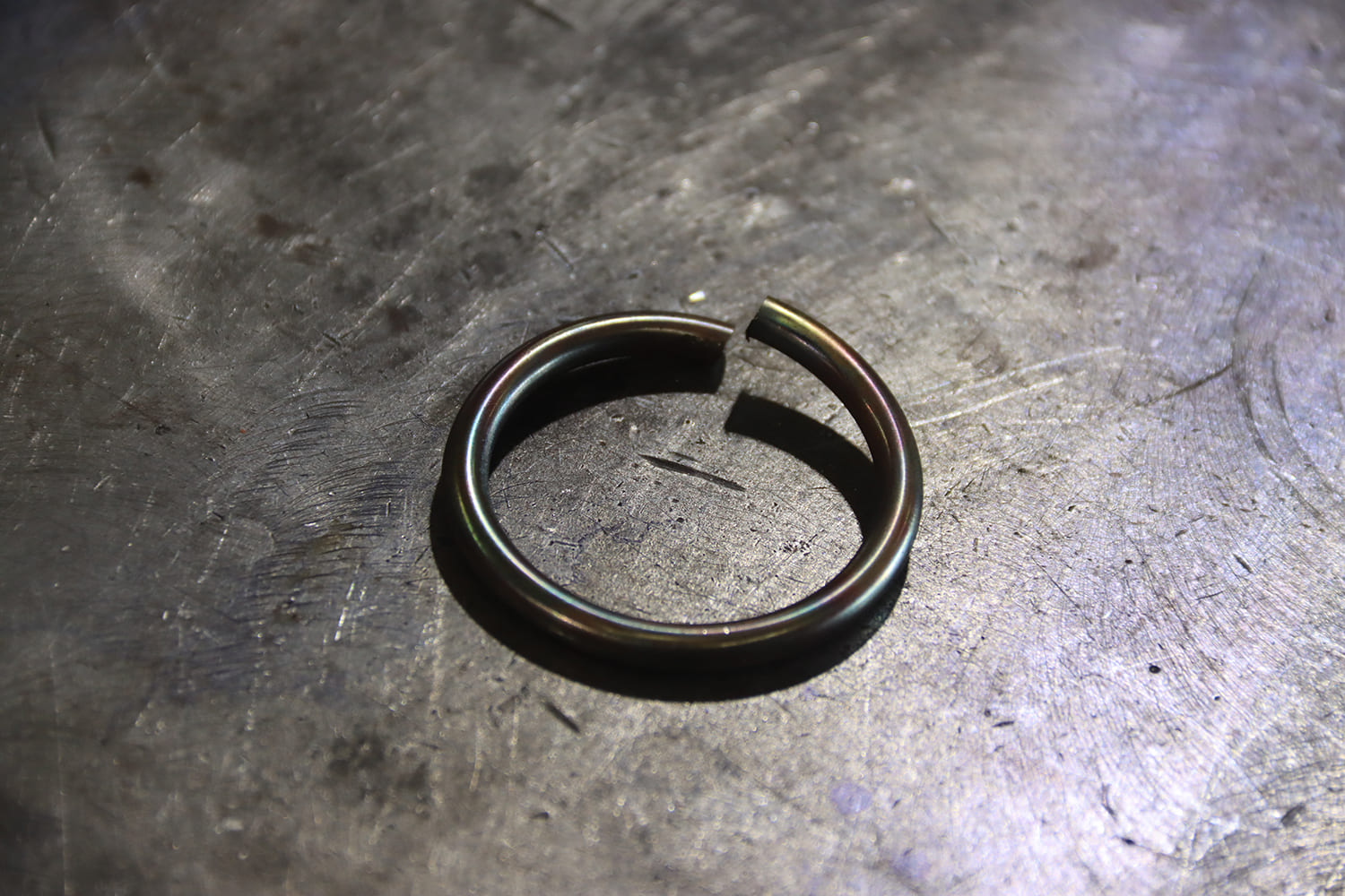 32 1967 chevy nova custom core support spring steel retaining ring laid out on table