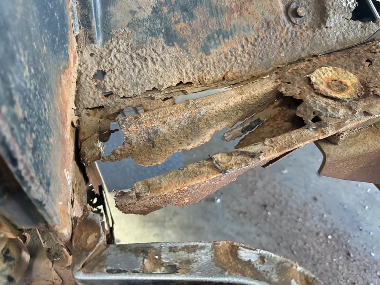 1959 Ford F-100 door post damage