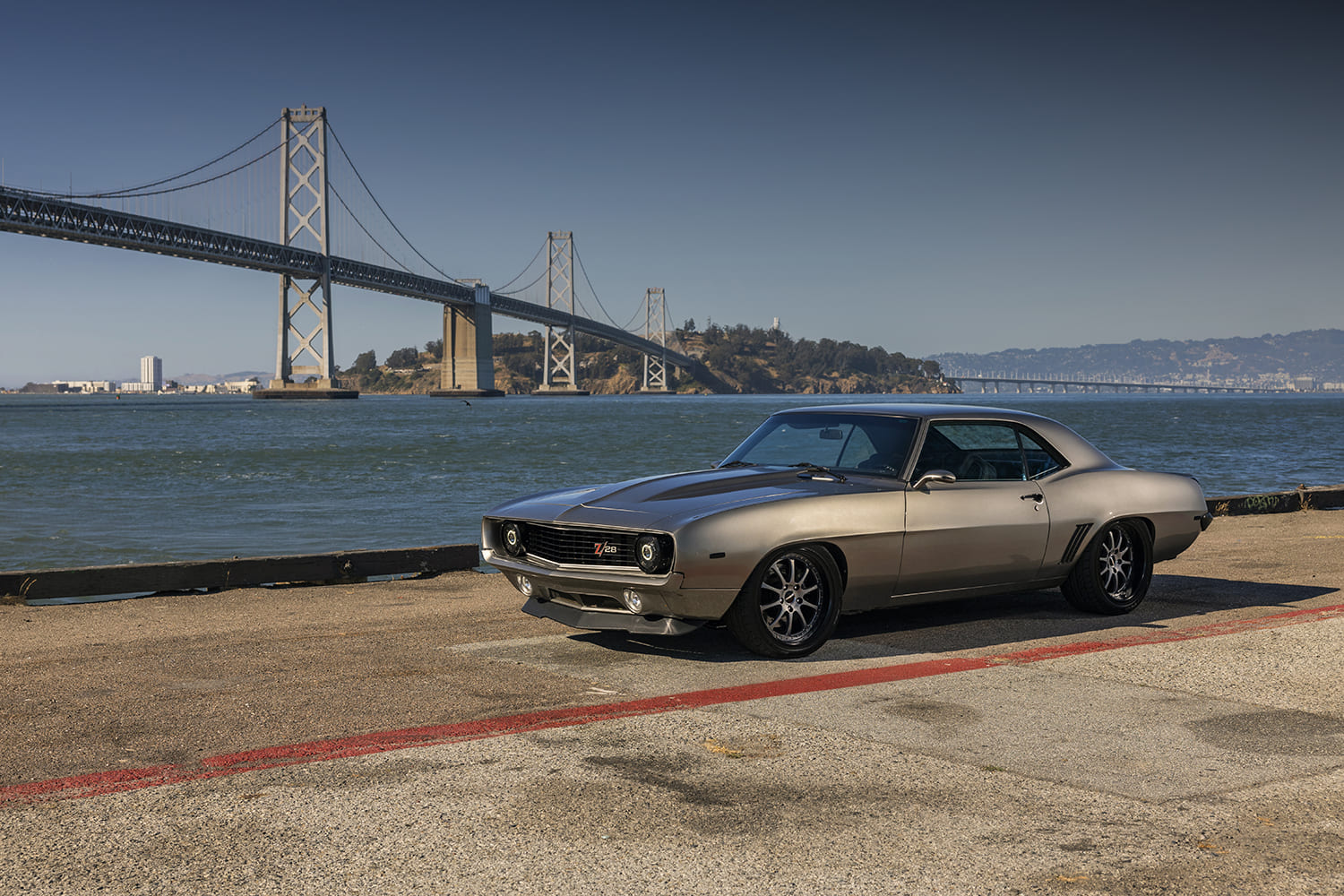 1969 Chevrolet Camaro Z28 pro touring matte silver paint Forgeline wheels Bay Bridge backdrop