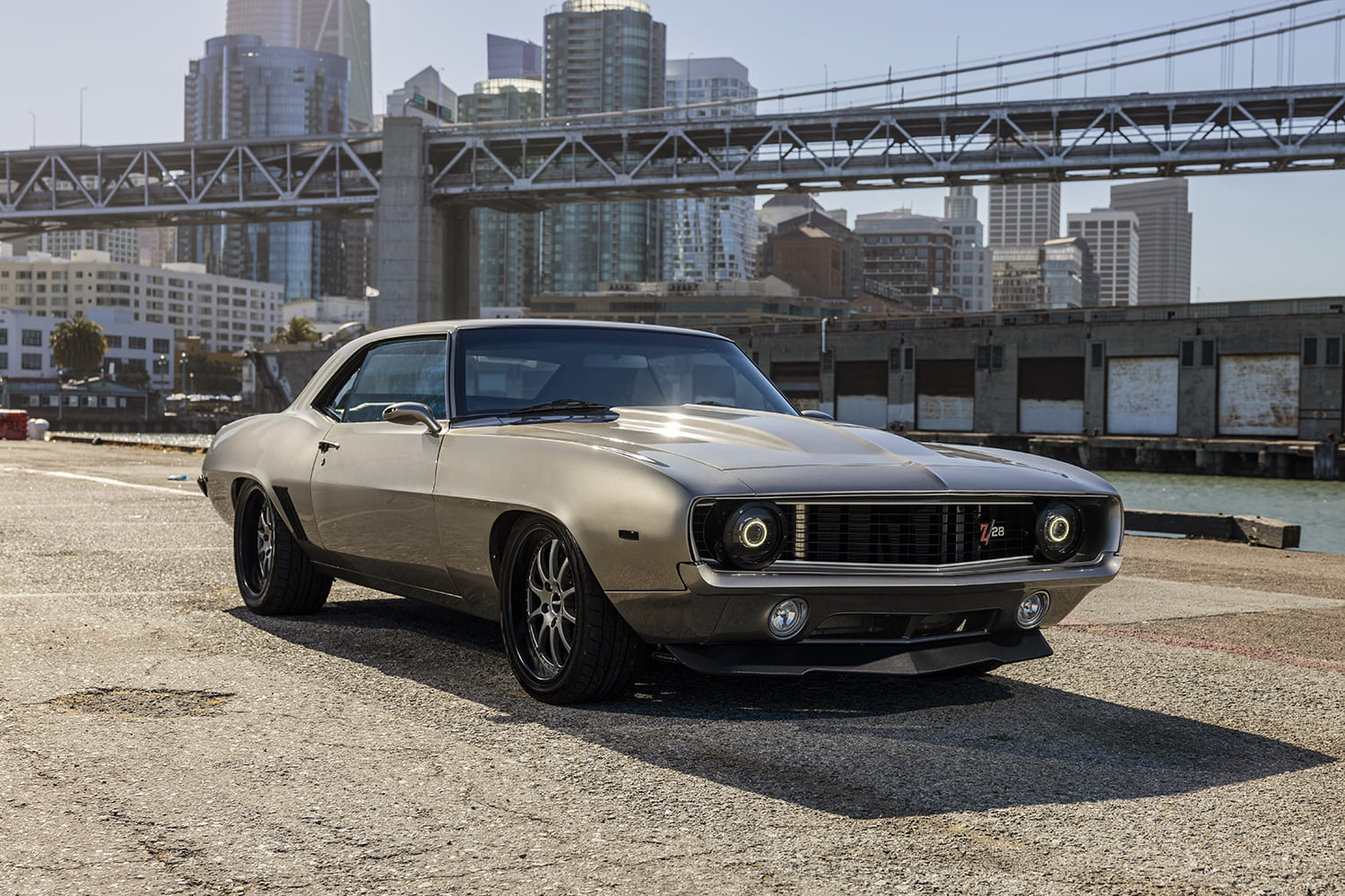 pro-touring 1969 Chevrolet Camaro Z28 side profile mini tub rear performance tires modern suspension