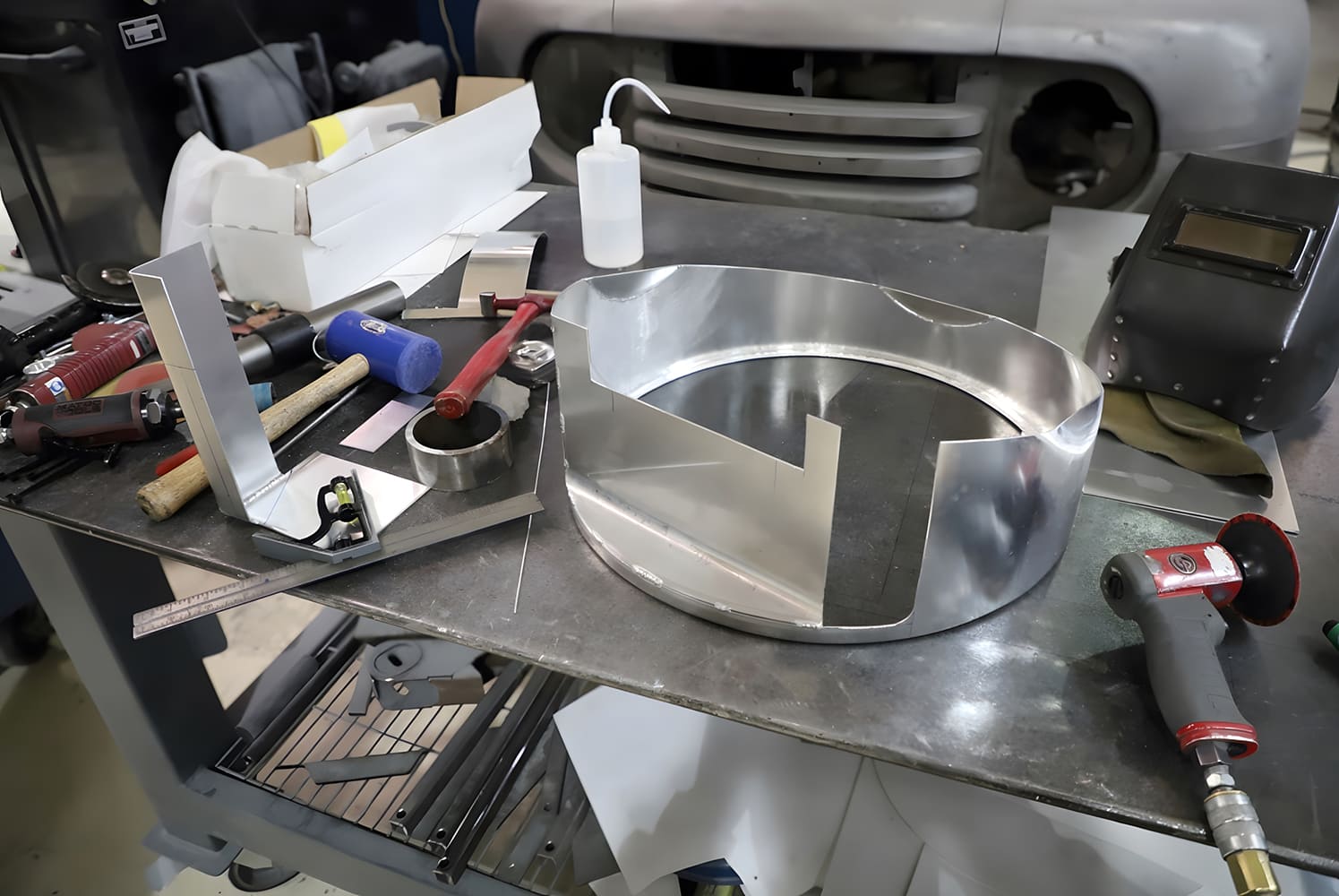 1965 Chevy Corvette Fan shroud trimmed for clearance and clamped during metal finishing phase