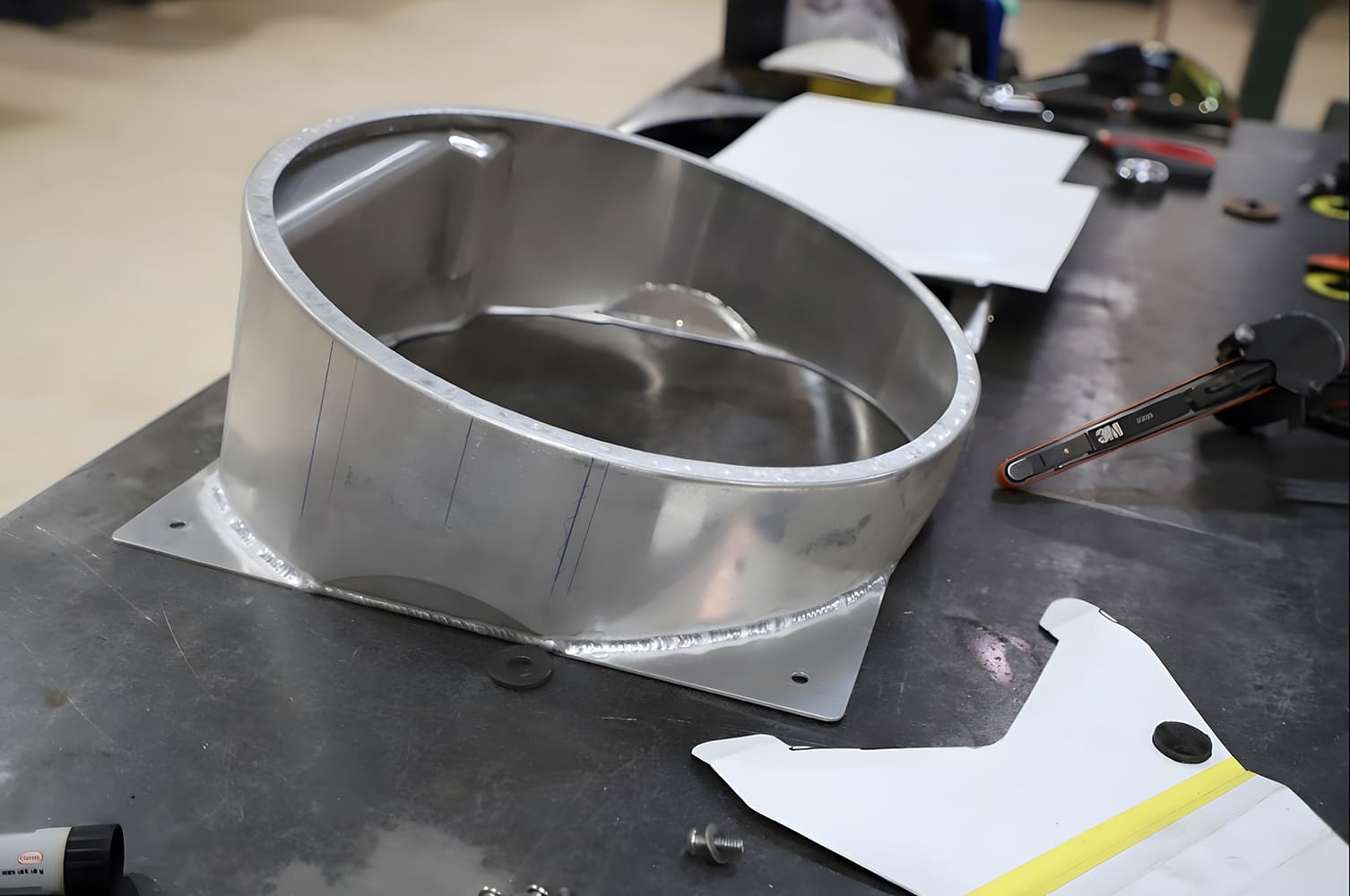 Fan shroud tack welded with boxed recess and blended seams for strength and airflow