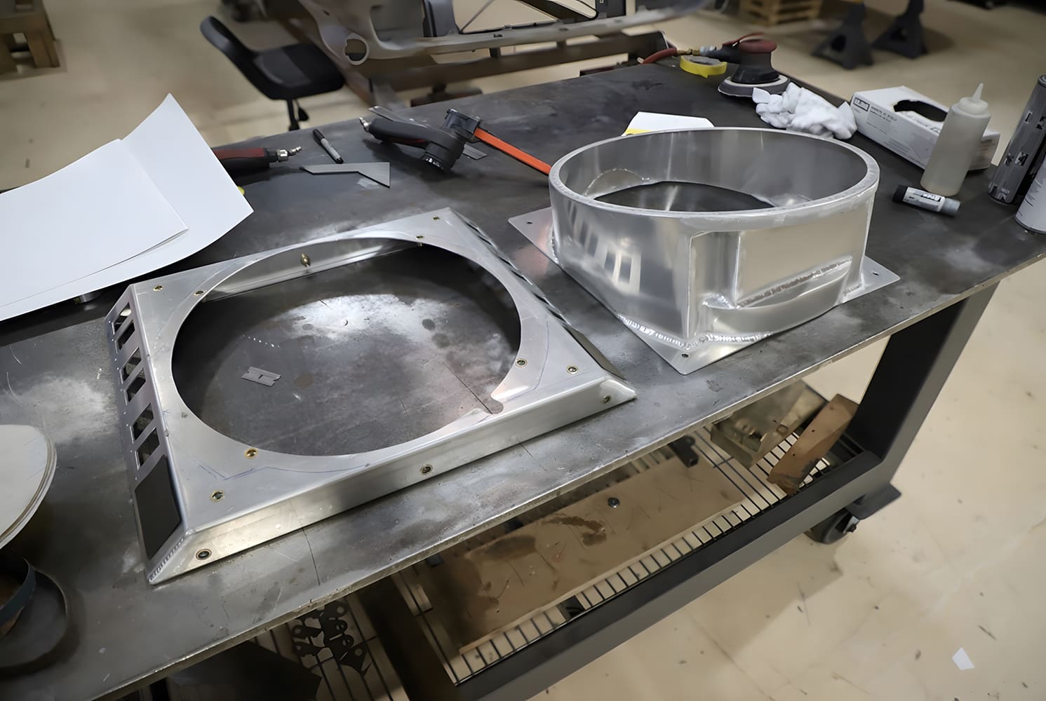 010 1965 Chevy Corvette Fabricated aluminum fan shroud and backing plate laid out on fab bench pre assembly