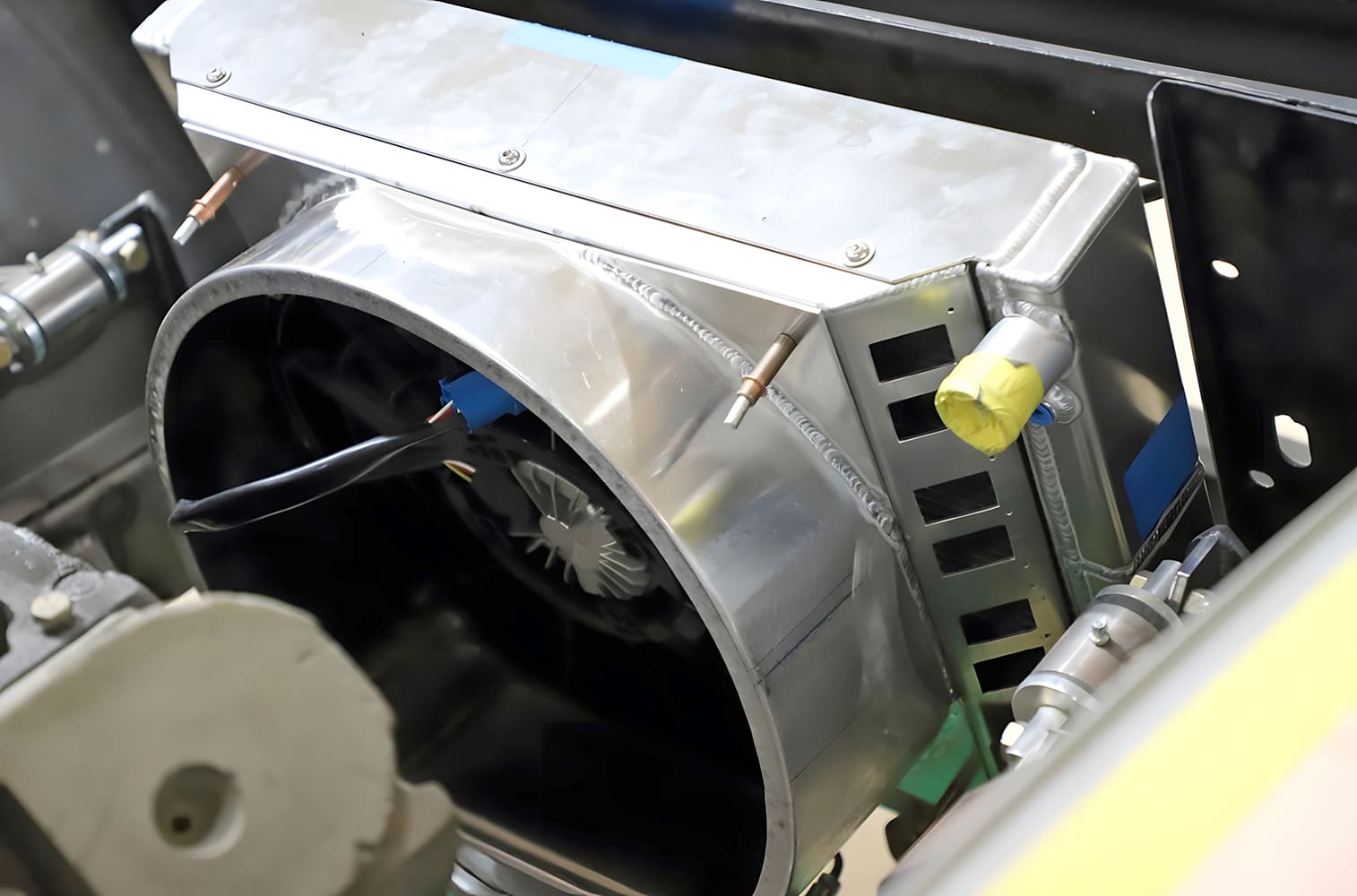 011 1965 Chevy Corvette Fully welded aluminum shroud and SPAL fan mounted to radiator with clecos