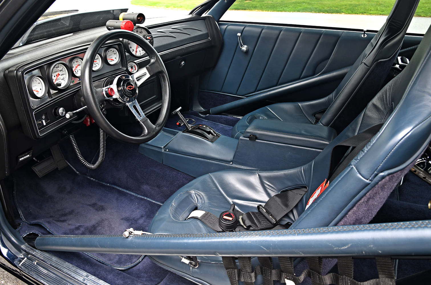 G-body Malibu drag interior AutoMeter Phantom gauges roll cage racing bucket seats