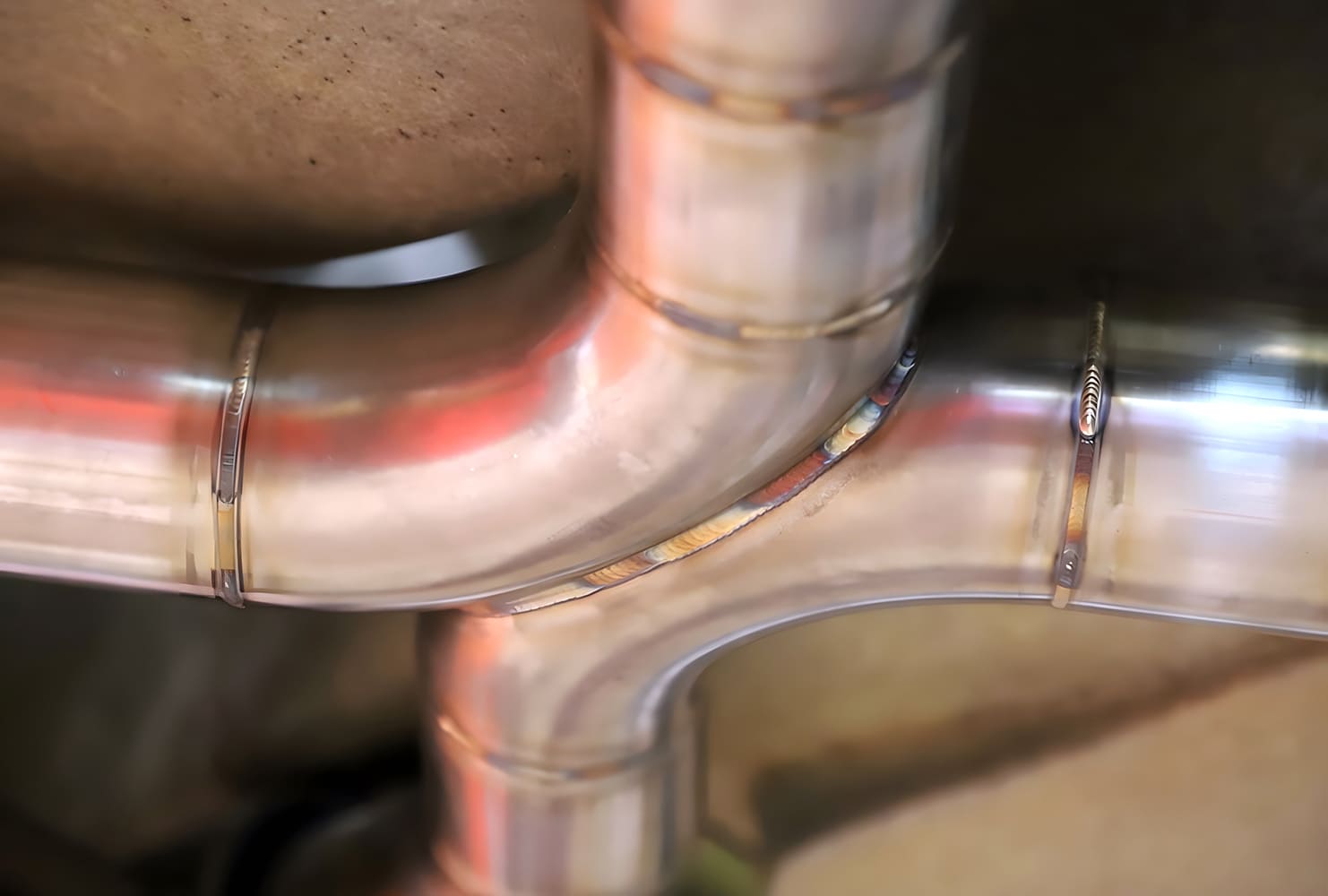 closeup of tig-welded X-pipe