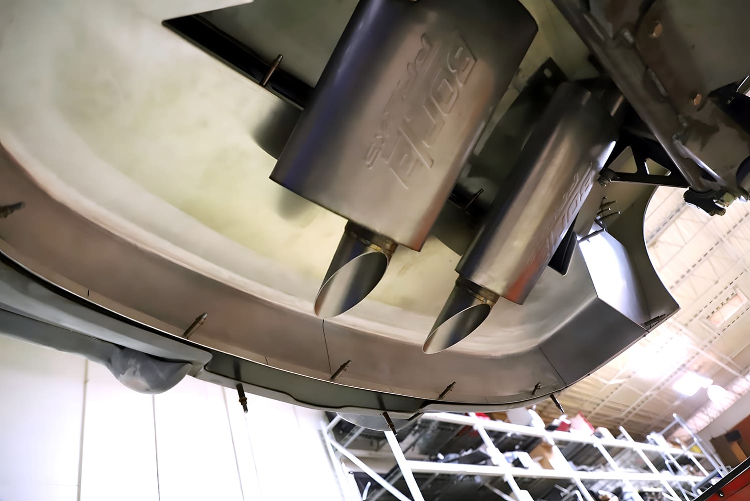 corvette custom integrated panel and angled tips exiting through hand formed rear valence