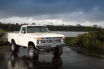 04 1977 Ford F 150 chrome bumper lake backdrop lifted off road build