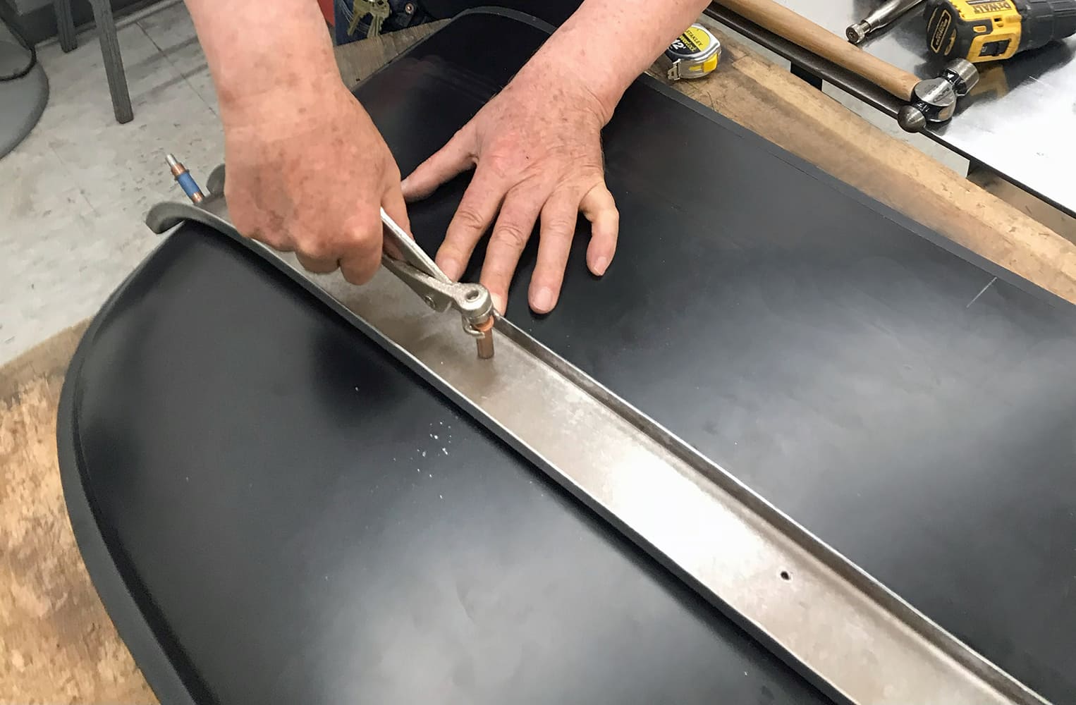 installing cleco fasteners on a roof brace