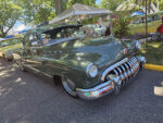 green early 50s buick custom with sunvisor