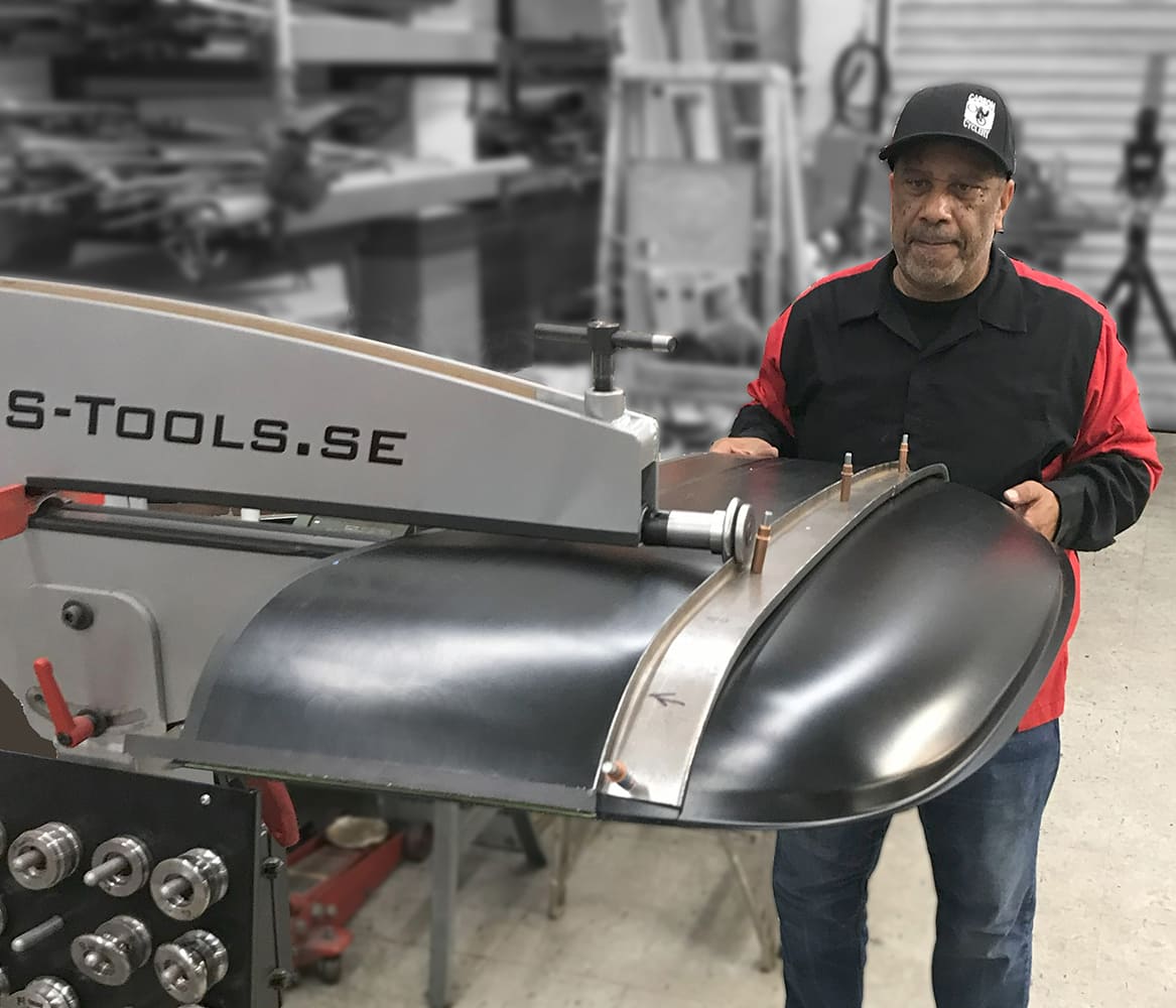shaping a roof panel on an english wheel