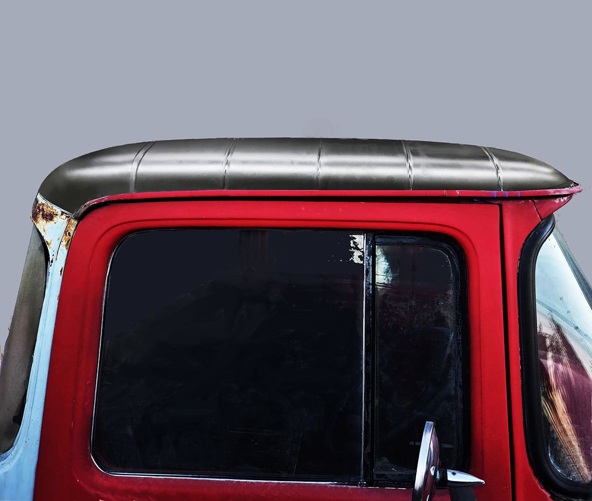 Test-fitting a custom roof insert on an F-100
