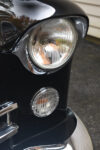 25 1948 Cadillac convertible front headlight detail restored lens chrome bezel classic American luxury