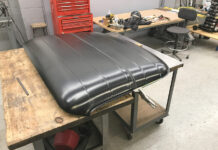 A 1956 Ford F100 Gets a Nomad-Style Roof ford f100 custom bead rolled roof panel on bench